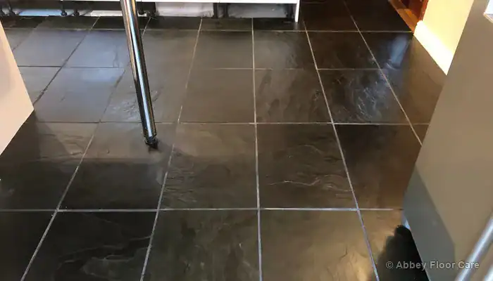 Restored slate floor with richer colour and a low surface sheen