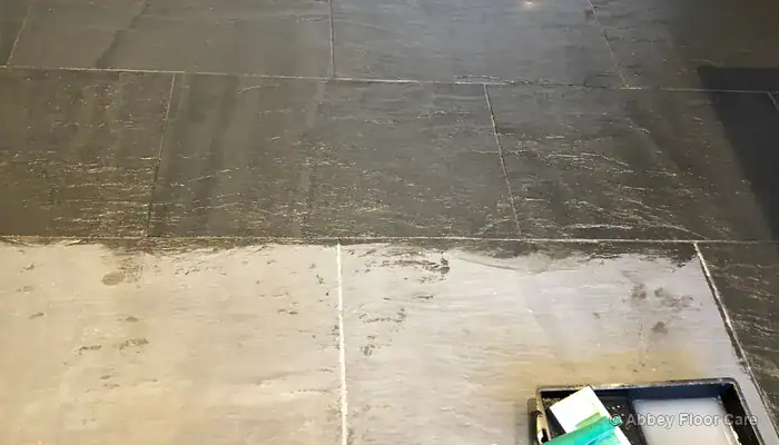 Slate floor with a new topical finish applied over a prepared surface